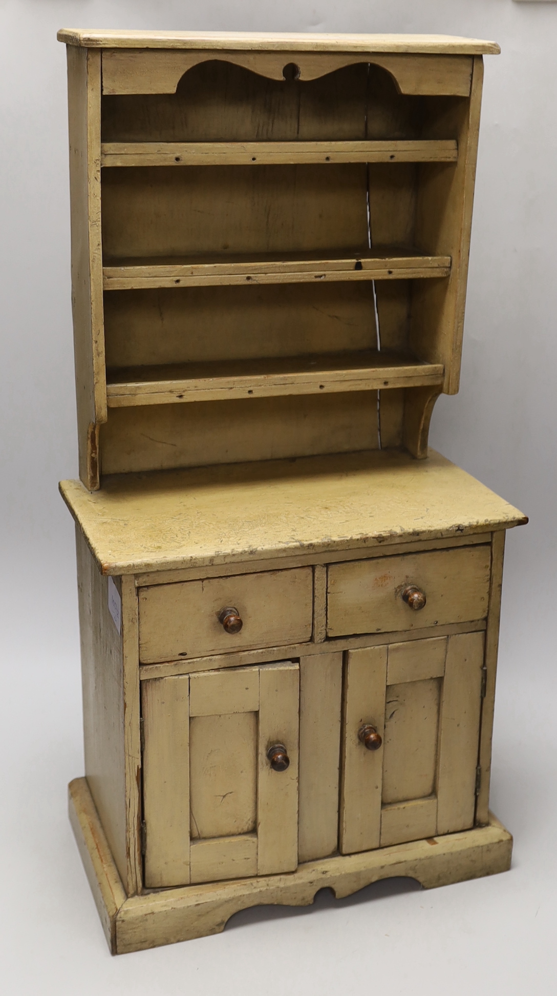 A 19th century painted pine miniature dresser and rack, 67cm high